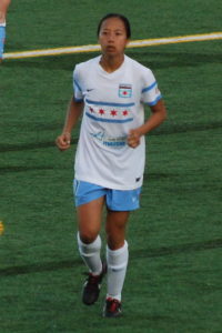 Former Stanford soccer player Rachel Quon, playing pro soccer in 2014 (Courtesy Wikimedia/Headlocker/Creative Commons 2.0)
